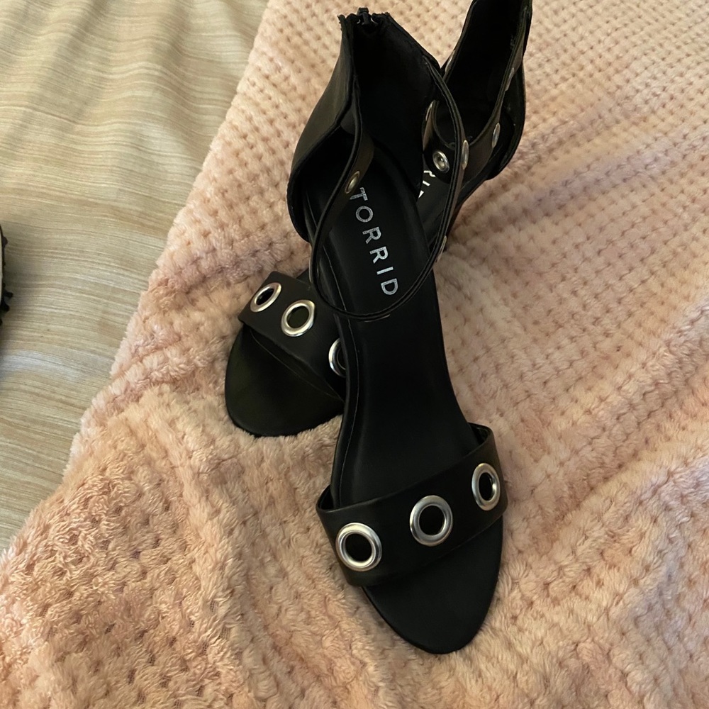 Black open toe heels with silver grommet detail